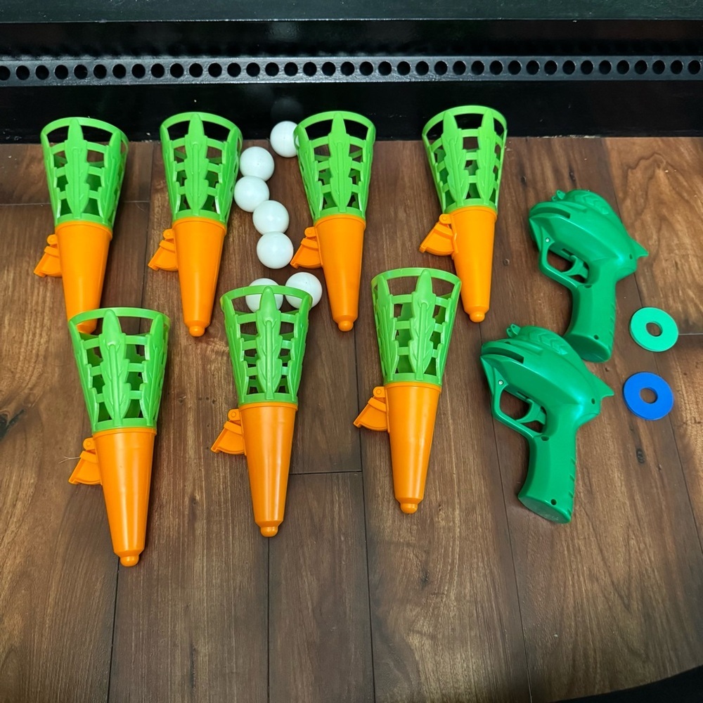 Green and Orange Toy Ball Launcher Set